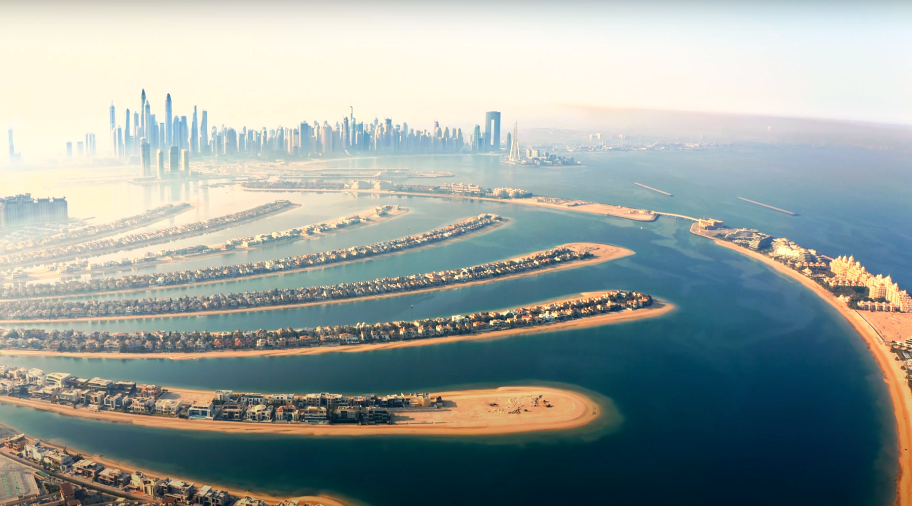 Aerial view of Palm Jumeirah, Dubai, highlighting luxury villas and unique architecture