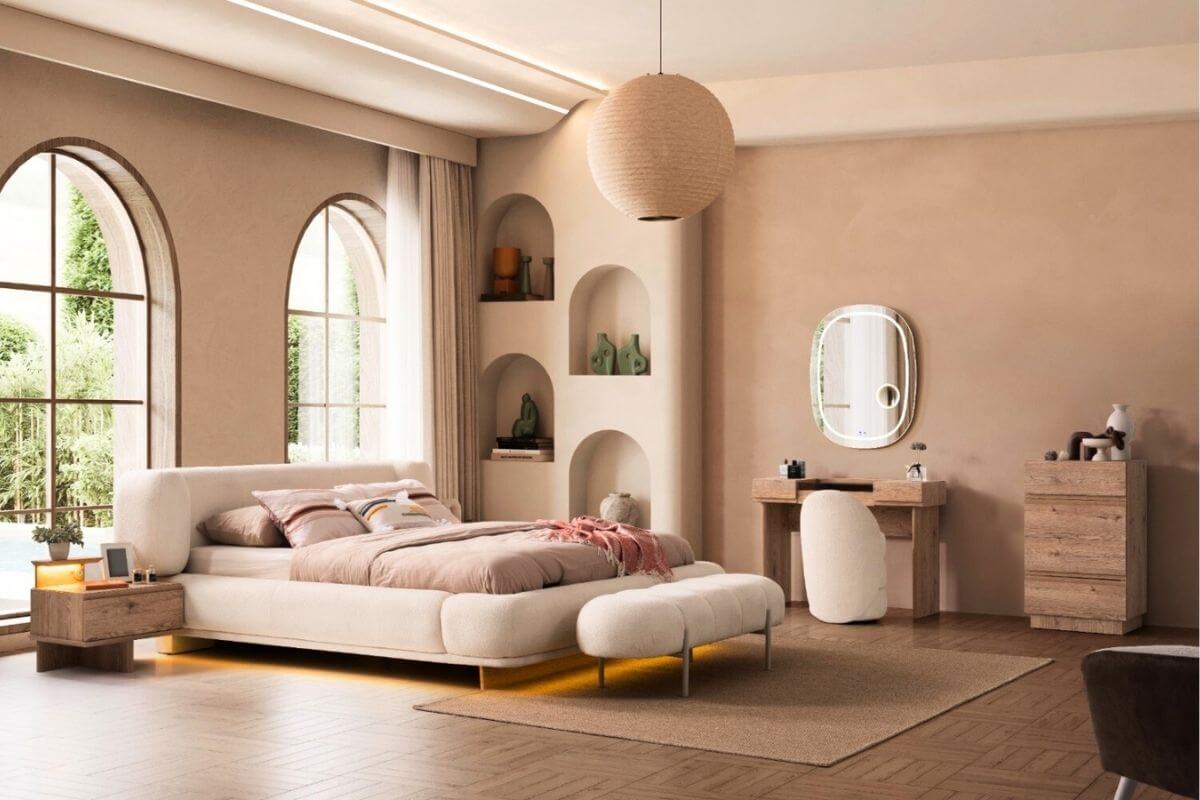 A cozy bed dressed with light-toned bedding and linen cushions, creating a peaceful and fresh atmosphere perfect for spring mornings.